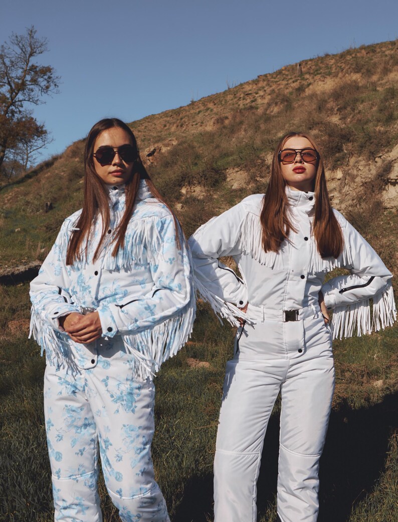 Traje de esquí blanco con flecos, traje de nieve de una pieza, traje de nieve blanco para mujer para deportes de invierno con borlas, mono cálido de invierno, traje de esquí y nieve. imagen 11