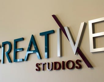 Steel with a matte white painted front surface. 3D Laser Cut Logo Sign: Acrylic & Metal Sign,  We are preparing a mock-up for your approval