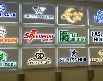 May include: A wall display featuring twelve rectangular, backlit signs with company logos and names including Global Bank, Aurora Motors, Starlight Cafe, Oceanic Shipping, Burger Barn, Speedpost Courier, Tech Solutions, Fashion House, Eco-Builders, Artisan Bakery, Fitness Hub, and Luxury Jewls.