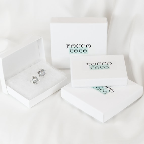 Pearl fish shop hook earrings