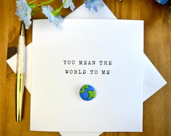 You mean the world to me card, with world charm, sentimental anniversary card, meaningful birthday card, TLC0256