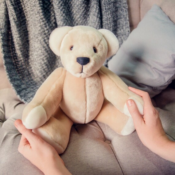 girl with giant teddy bear