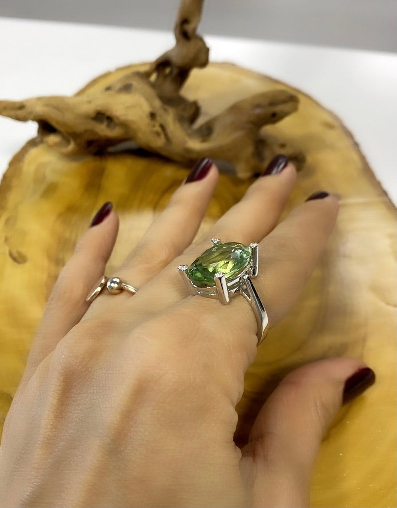 Green Amethyst Ring	
Sterling Silver Ring	
Green Gemstone	
Green Amethyst	
Prasiolite Ring	
Engagement Ring	
Large Amethyst Ring	
Amethyst Jewelry	
Amethyst Ring Gold	
Silver Amethyst Ring	
Gemstone Ring	
Delicate Ring	
Anniversary Gift
Gift For Her