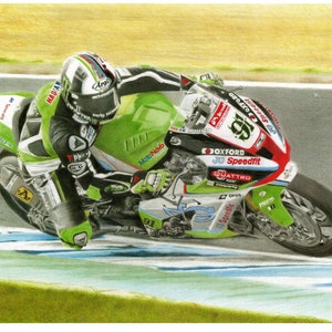 Leon Haslam en la Kawasaki en plena acción de carrera y A4 PRINT