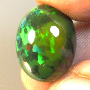 7.83Cts Excellent Color Play Natural Black Opal Oval Shape Cabochon