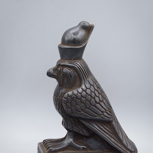 statue of Egyptian art falcon bird God Horus black made in egypt