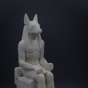 Estatua de Anubis sentado Dios de la Muerte Escultura granito, piedra de mármol pesada hecha en Egipto