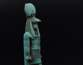 statue Thoth god of the moon and wisdom green ancient Egyptian art made in Egypt
