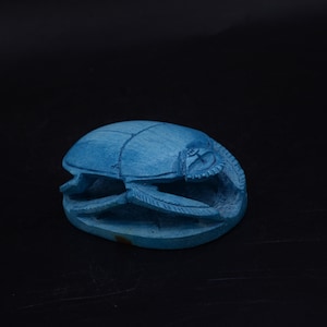unique sacred scarab beetle Amulet blue Sculpture carved stone ancient Egyptian art made in Egypt