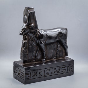 Statue of Hathor Protecting Psamtik This schist statue depicts Psammetik standing in a posture of prayer heavy black made in egypt