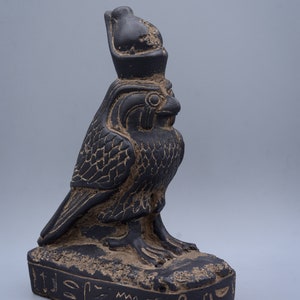 statue of Egyptian art Falcon Bird god Horus black stone made in egypt