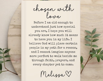 May include: A rectangular off-white book cover featuring the black printed text: chosen with love, followed by a paragraph about faith and life, ending with the name Melissa and a heart symbol. The design is centered on a light-colored surface.