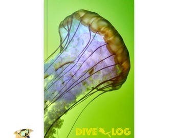 May include: A green cover with a jellyfish image and the text "DIVE LOG" in yellow.