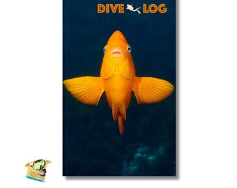 May include: A blue cover with the text "DIVE LOG" in orange. A bright orange fish with blue eyes is swimming towards the camera.