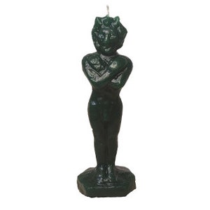 May include: A dark green candle shaped like a person with arms crossed over their chest. The candle has a detailed face and is standing on a square base.