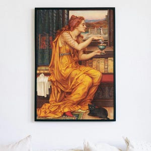 May include: A painting of a woman in a yellow dress pouring liquid from a small cup into a larger cup. She is sitting on a bench with a black cat at her feet. The painting is framed in black.
