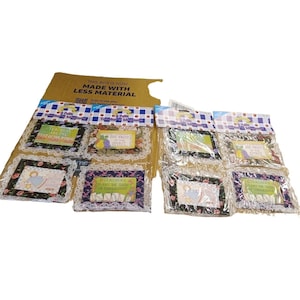 May include: Eight small framed fabric squares with inspirational quotes about teachers. The quotes include "Teachers are the best of the bunch", "The fruit of the spirit", "Teachers plant the seeds of knowledge", and "Teachers plant the seeds of knowledge".