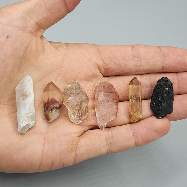 Set of Quartz - Kaolinite Quartz, Red Phantom Quartz, Fenster Quartz, Lithium Quartz, Citrine Quartz and Hedenbergite Quartz