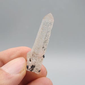 Helvite on Clear Quartz from Guangdong, China