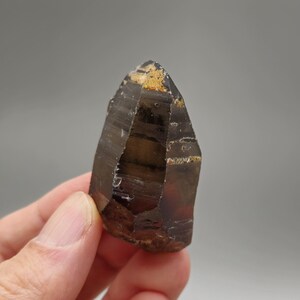 Saturated Smoky Quartz Point with Rainbow iridescent from Nigeria
