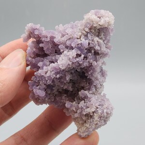 Botryoidal Chalcedony Cluster with Quartz Microcrystals .– Soft Purple and White Contrast