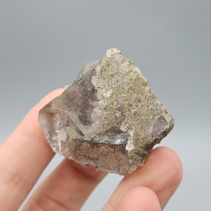 Trisoctahedral Clear Fluorite Cube with Purple and Green Phantom Covered with Clear Quartz UV Reactive