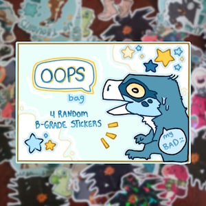 May include: A blue and yellow sticker with a cartoon dinosaur saying "oops" and "my bad". The sticker says "4 random B-grade stickers" and "oops bag".