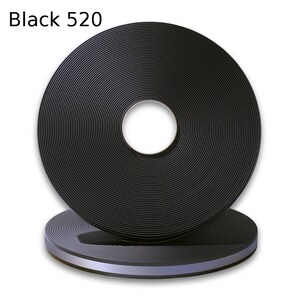 May include: A roll of black 520 webbing with a silver reflective stripe. The webbing is rolled up and the silver stripe is visible on the edge.