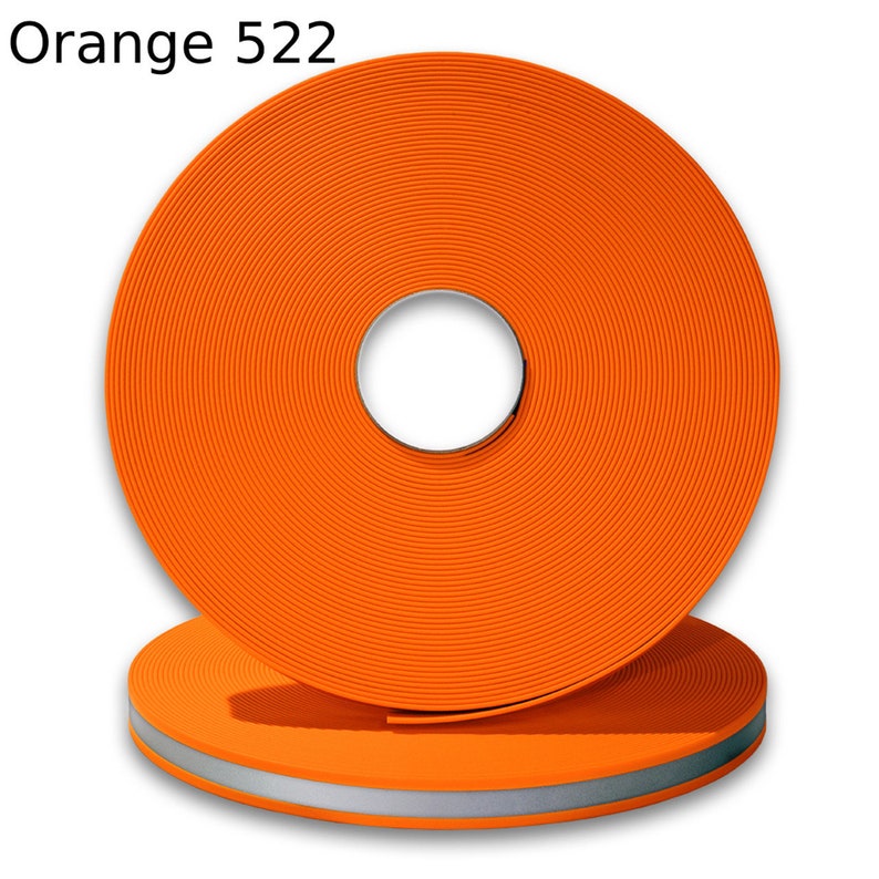 May include: A roll of orange reflective webbing with a silver reflective stripe. The roll is labeled "Orange 522".