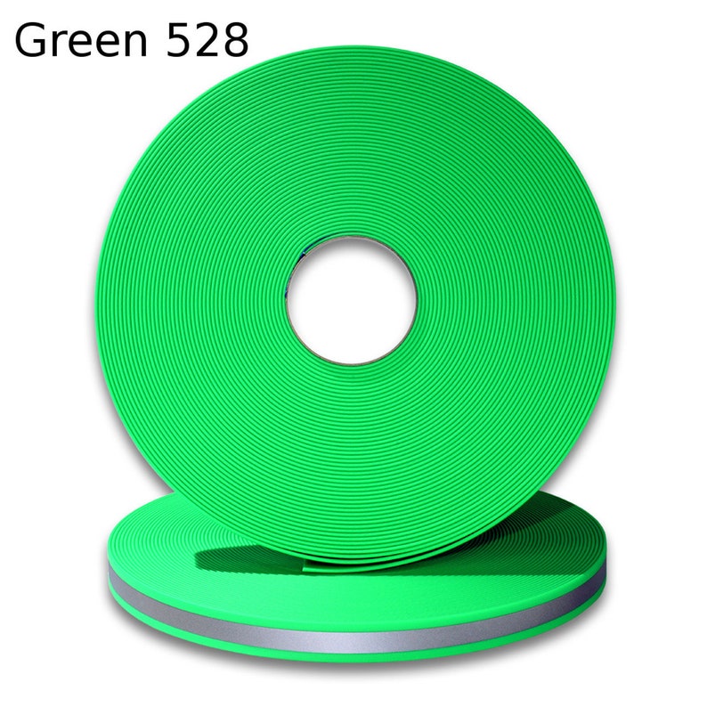 May include: A roll of green reflective webbing with a silver reflective strip. Green 528.