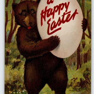 L'ours brun de Pâques tient une carte postale fantastique avec un oeuf géant Valentine & Sons antique RARE