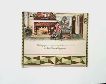 May include: Vintage Christmas card featuring a cozy interior scene with a fireplace, spinning wheel, and a woman. The card includes the text "Wishing you a very merry Christmas and a New Year of happiness" in elegant script. The border has a geometric design.