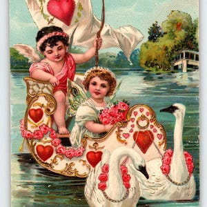 Carte postale ancienne de la Saint-Valentin Cupidon et sa fille dans un bateau-cygne - Allemagne - Gel Brillant