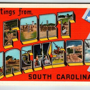 May include: Greetings from Fort Jackson, South Carolina postcard with a red, white, and blue color scheme. The postcard features a large, stylized text design of "Fort Jackson" with images of military scenes and a blue sky.