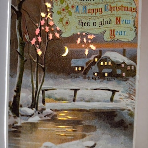 Hold To Light Postkarte Weihnachten Neujahr Schnee bedeckt Brücke Mond Blätter Zuhause HTL