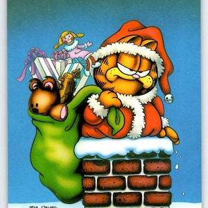 Carte postale de Noël Garfield, père Noël, chat coincé dans une cheminée Jim Davis 1978