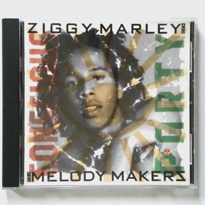 May include: A CD case featuring Ziggy Marley. The album cover has a portrait of Marley with the words "Ziggy Marley" and "Melody Makers" in bold text. The background has a distressed design with the word "Dirty" in large green letters.