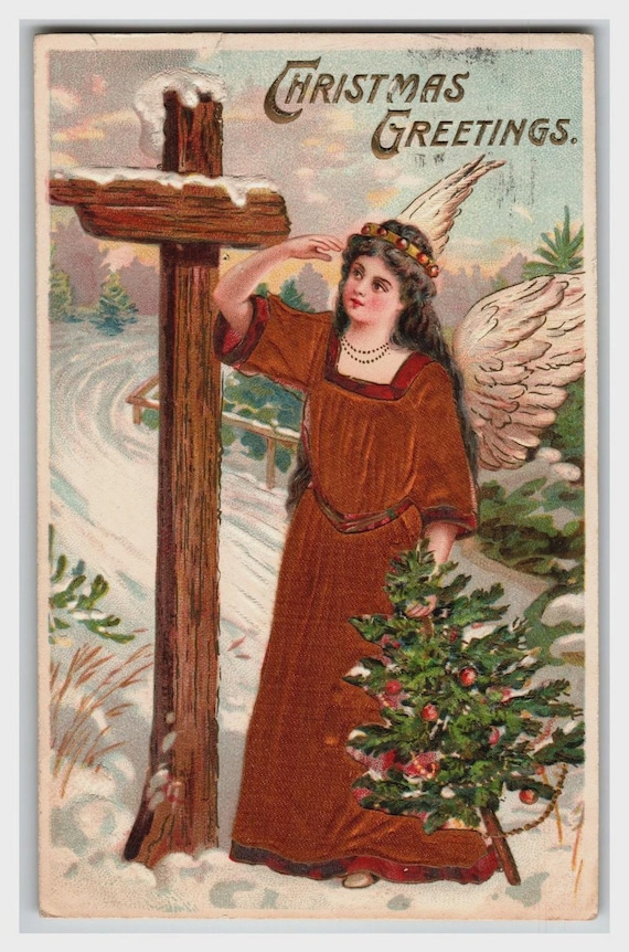 1910年頃のヴィンテージ、エンボス加工のクリスマスエンジェルポスト