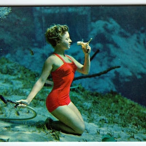 Carte postale Weeki Wachee Springs FL Femme mangeant une banane sous l'eau Yorkolor YL4081
