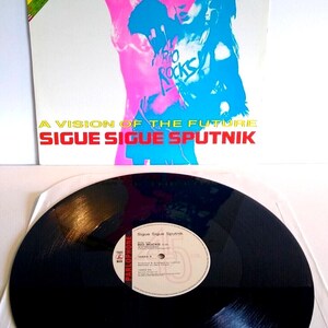 Sigue Sigue Sputnik Rio Rocks 12&quot; Vinyl Record UK Shock Rock Synth-Pop New Wave Unique Gift