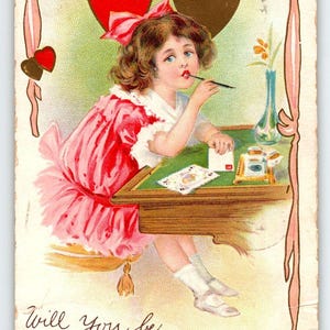 Carte postale Saint Valentin fille assise écriture stylo vintage série 313 Stecher 1914 cadeau unique