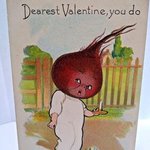 May include: Vintage Valentine's Day postcard featuring a cartoon character with a beet-shaped head and a surprised expression. The character is dressed in white pajamas and holds a candle. The text "Dearest Valentine, you do" is at the top.