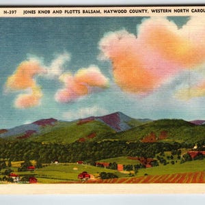 May include: A vintage postcard depicting Jones Knob and Plotts Balsam in Haywood County, Western North Carolina. The scene includes green hills, a valley with red-roofed buildings, and a sky with pink and orange clouds. The text "N-397 JONES KNOB AND PLOTTS BALSAM, HAYWOOD COUNTY, WESTERN NORTH CAROLINA" is displayed.
