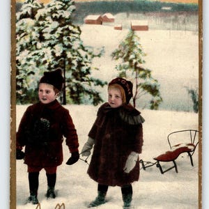 Weihnachtspostkarte Echtfoto Kinder Verschneite Bäume Schlitten Deutschland RPPC