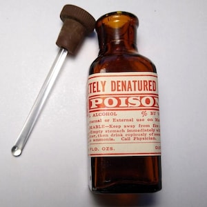 Amber Poison Medicine Bottle With Dauber Skull And Crossbones Pharmacists Label