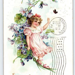 Carte postale Saint-Valentin fille papillon fleurs Loving Greetings vintage 1911 Tuck