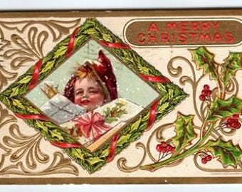 Carte postale de Noël 1912 Enfant avec lettre et houx en relief en relief