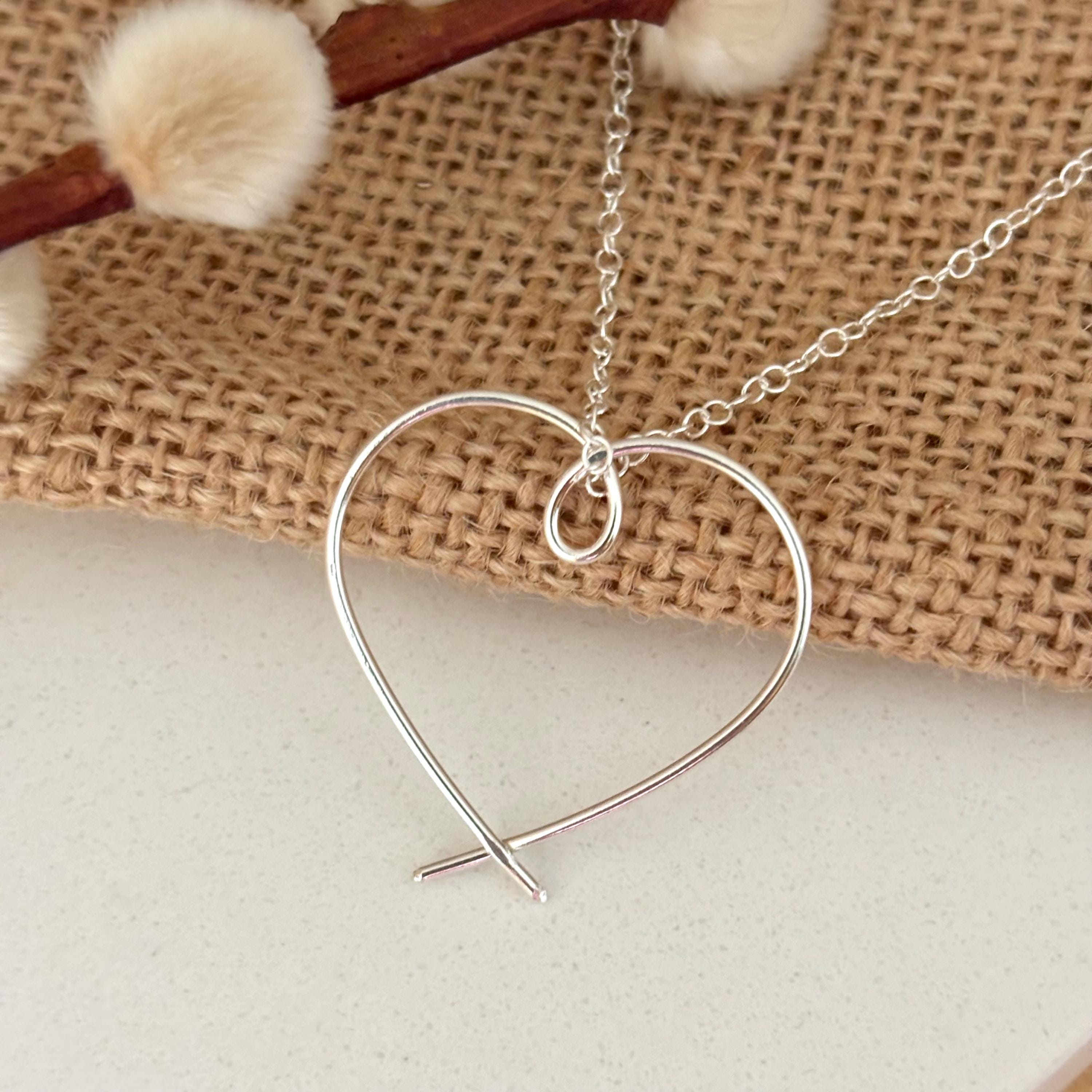 Silver chain with heart pendant discount