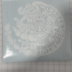 Escudo mexicano con calendario azteca