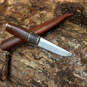 The puukko knife, m390 powder steel, micarta, leather sheath, hand made.